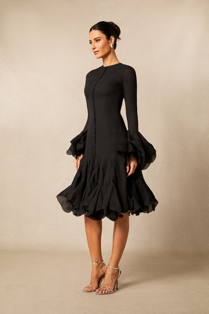 Vestido midi manga larga en negro, perfil