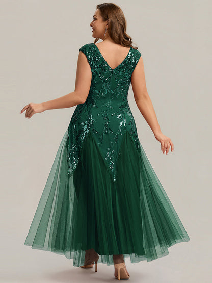Vestido largo de tul bordado en verde oscuro