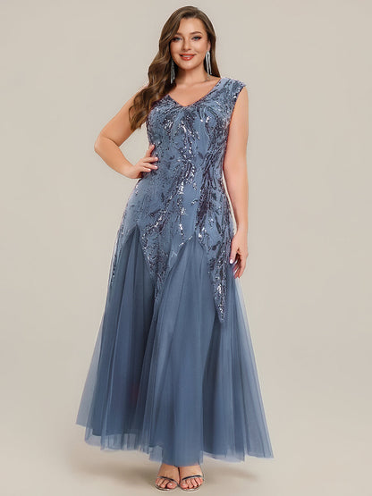 Vestido largo de tul bordado en azul marino ahumado