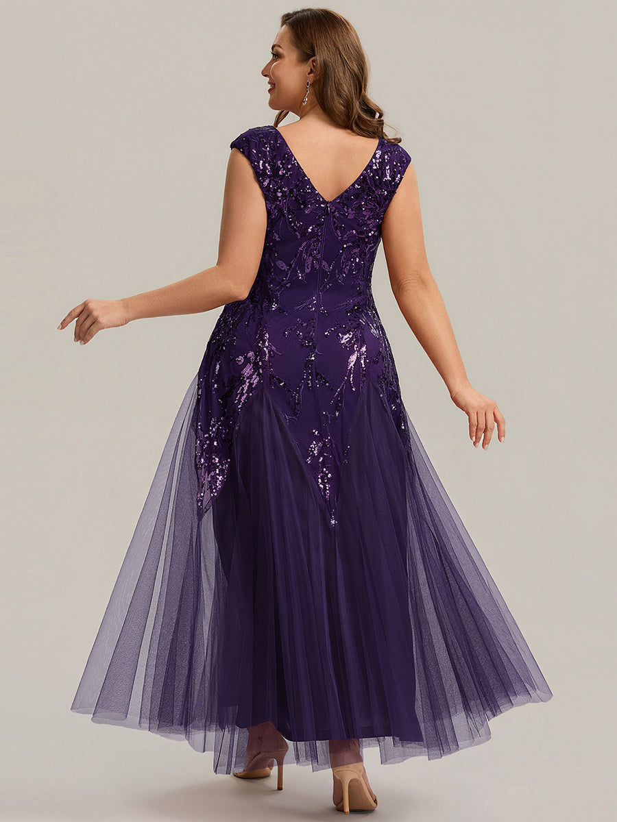 Vestido largo de tul bordado en morado oscuro