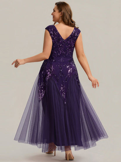 Vestido largo de tul bordado en morado oscuro