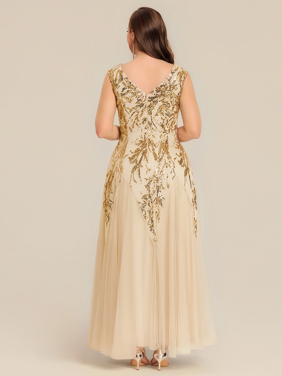 Vestido largo de tul bordado en dorado