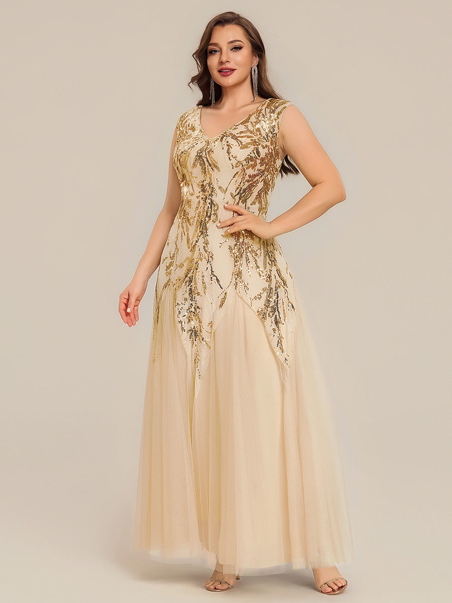 Vestido largo de tul bordado en dorado, detalle