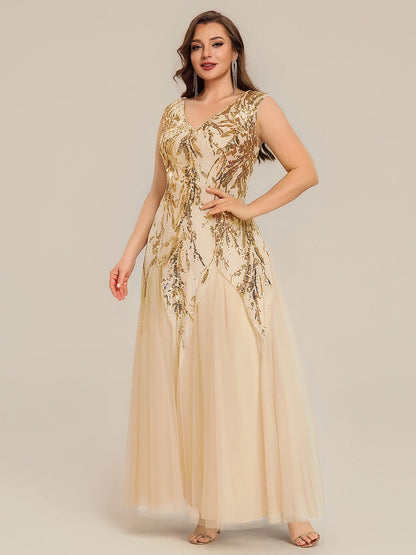 Vestido largo de tul bordado en dorado, detalle
