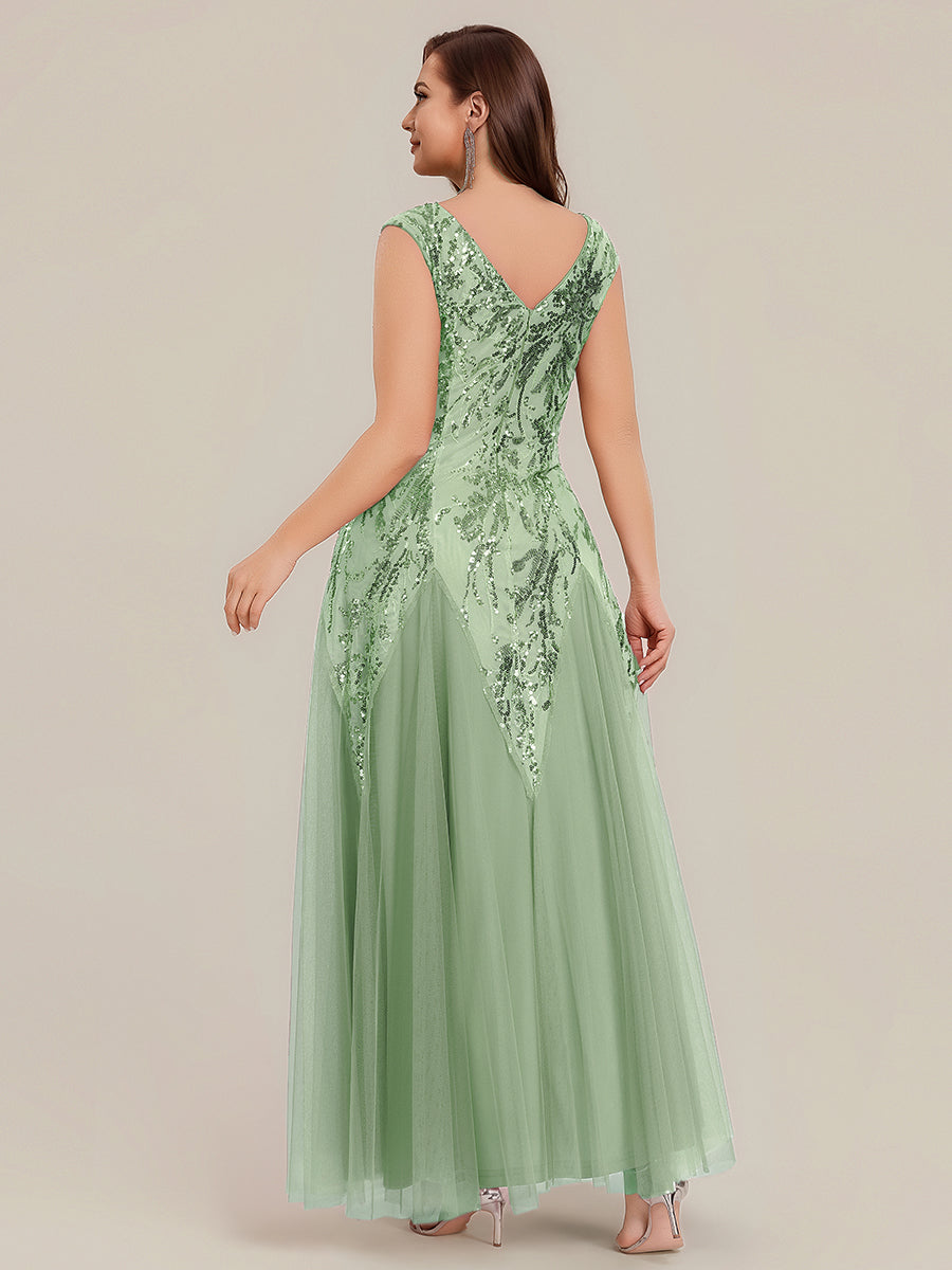 Vestido largo de tul bordado en verde menta