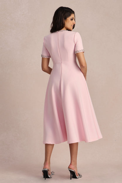 Vestido midi con lazo, movimiento de la falda