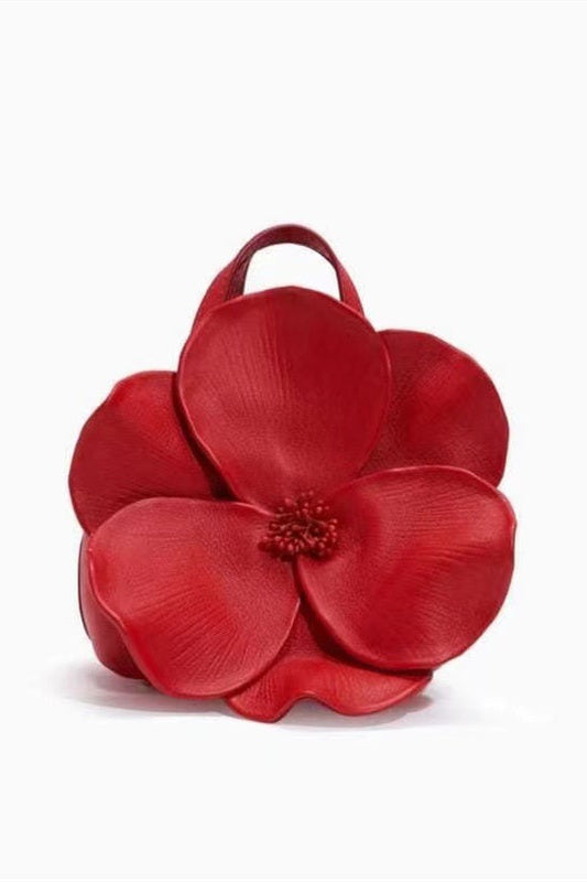 Bolso de mano con relieve floral