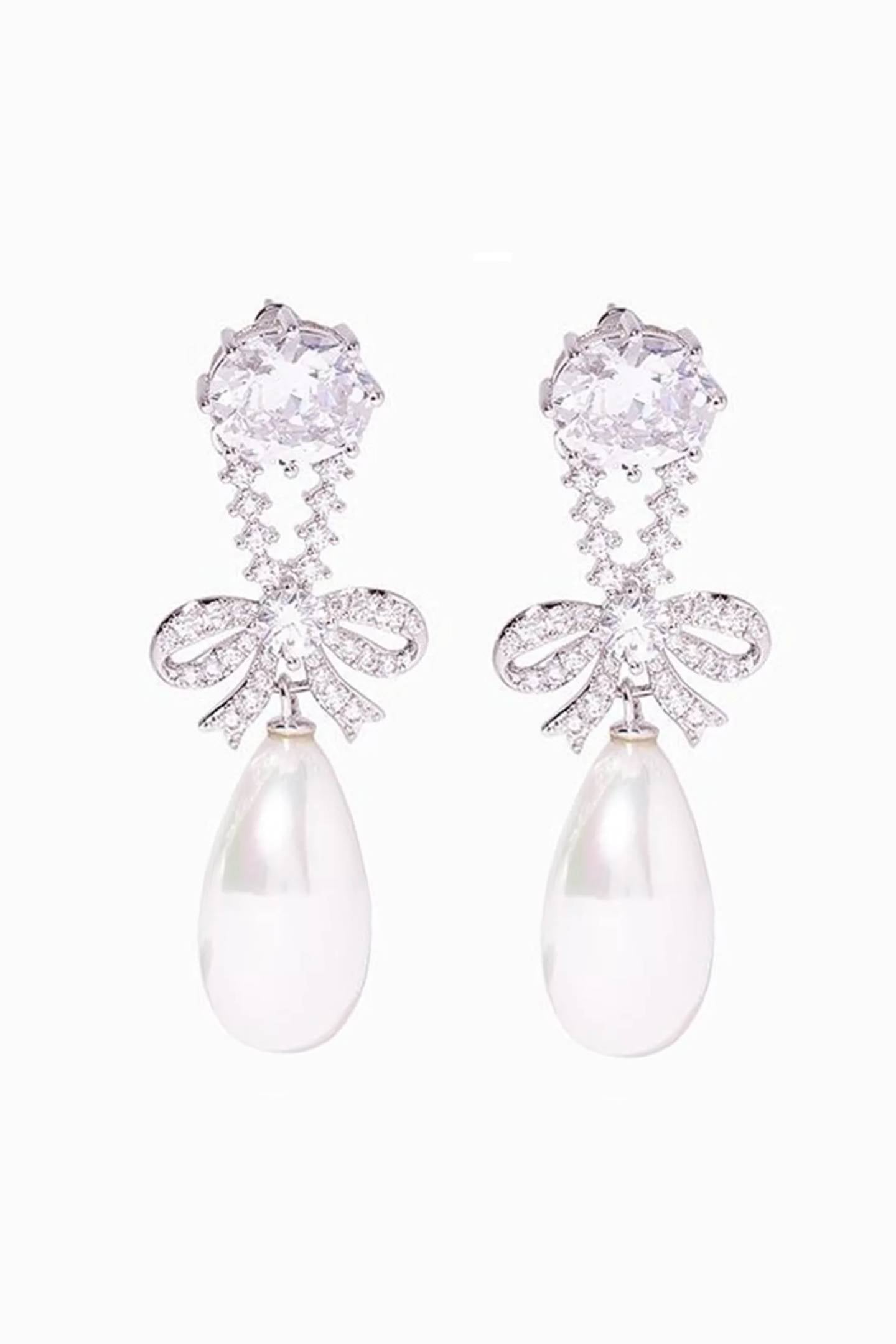 Pendientes de perla con forma de lazo